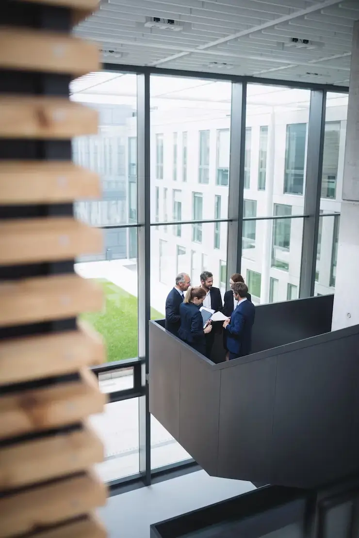 businesspeople-having-discussion-office_107420-84844